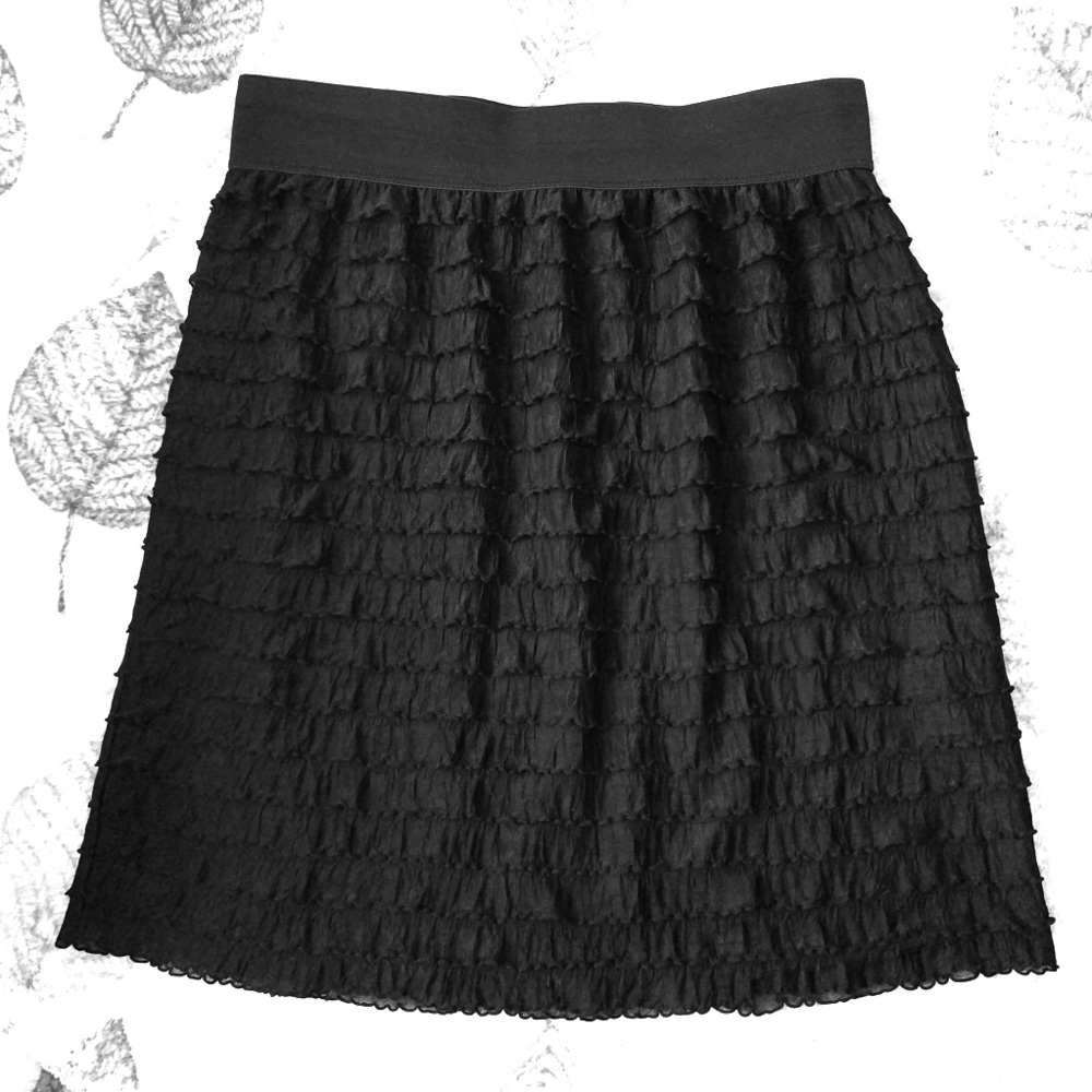 Black ruffle mini skirt